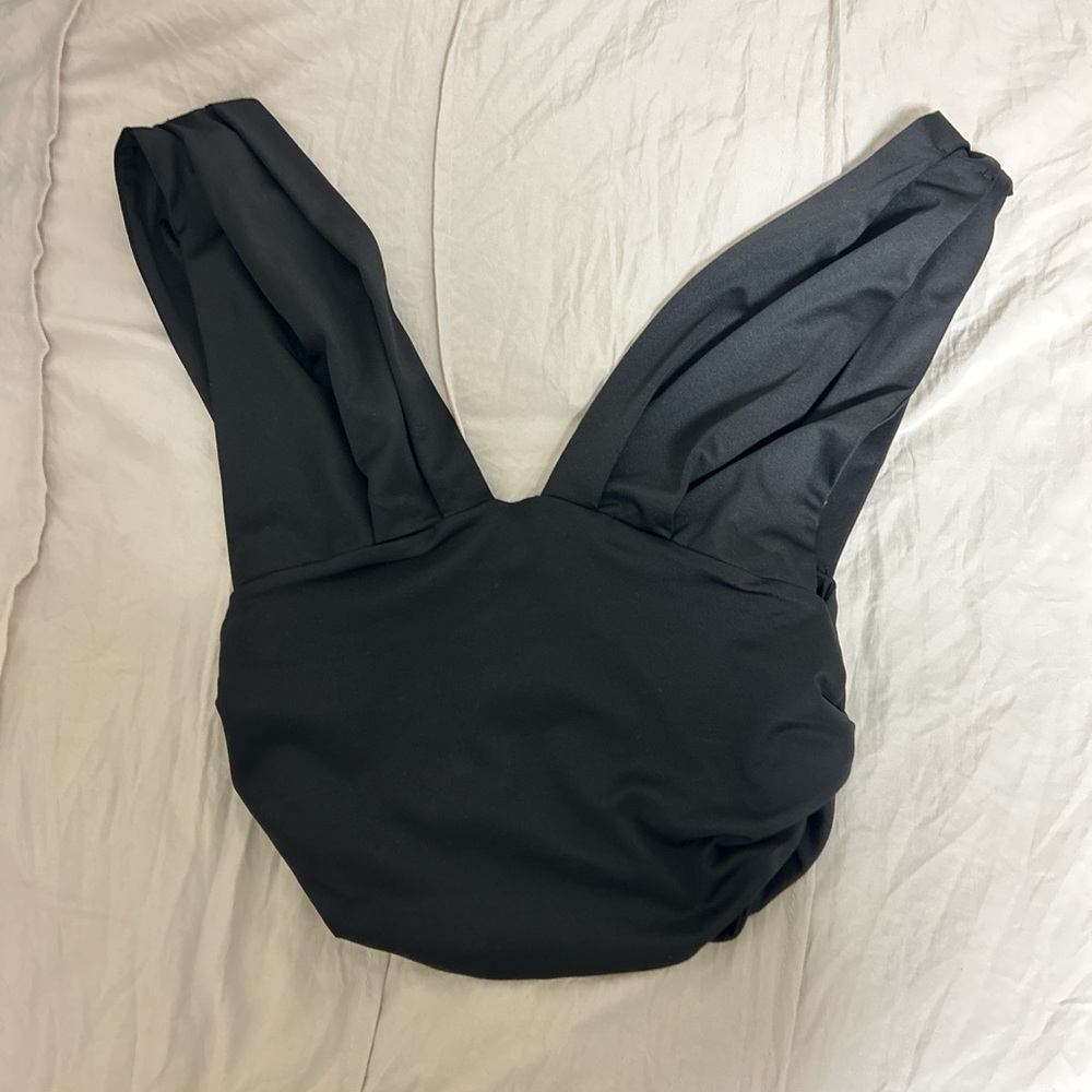Black going out top
